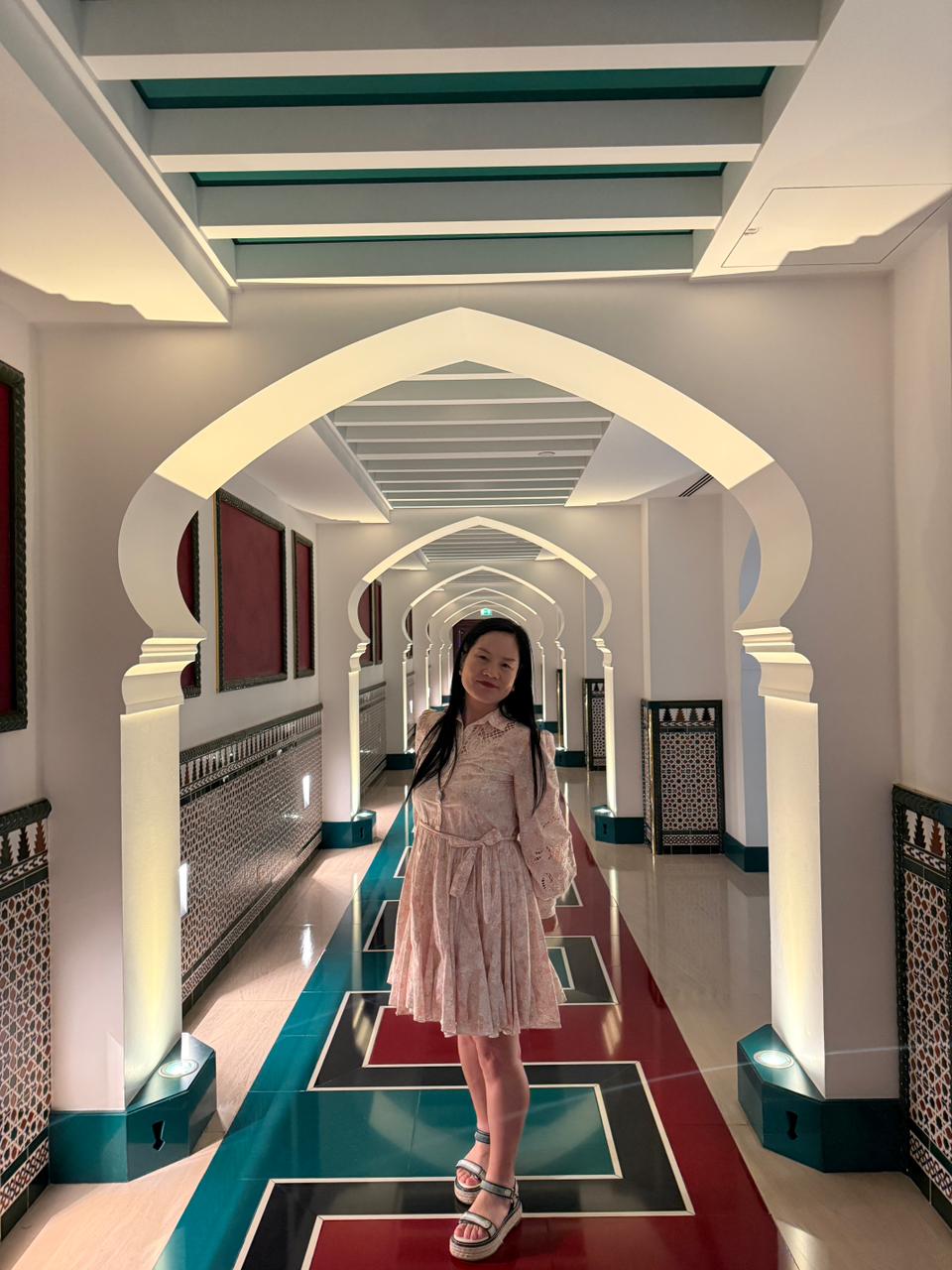 a woman with her hand on her face