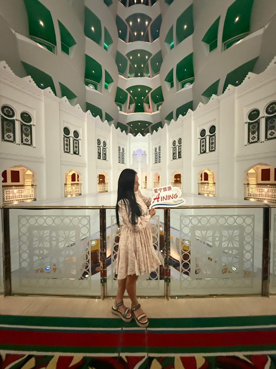 a woman with her hand on her face